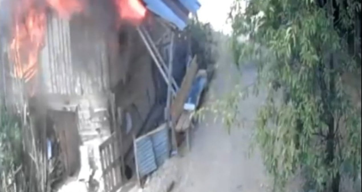 anne ve engelli oglunu kurtarmak icin alevlerin icine daldi M4n9rJ9J