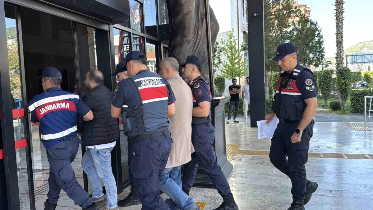 sahte pasaportla dolandiricilik operasyonu QiJiG2Sq.jpg